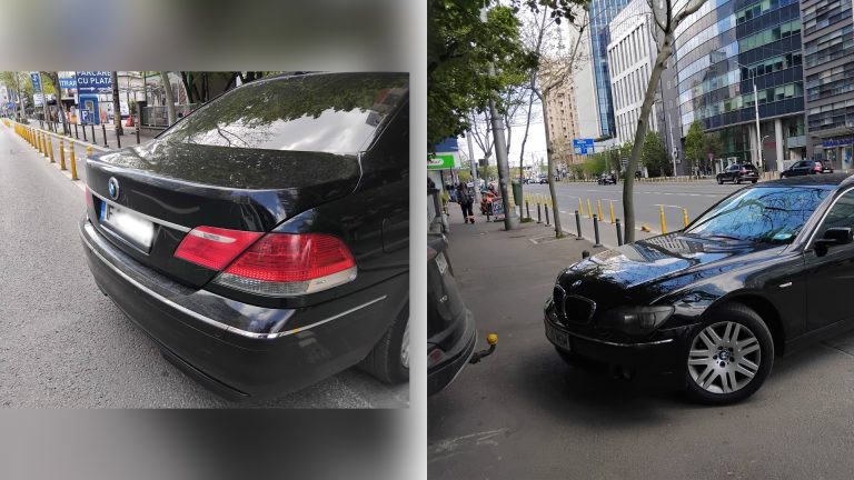 BMW negru parcat ilegal pe trotuar într-o zonă urbană aglomerată