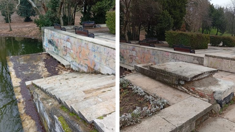 Trepte degradate din beton lângă lac în Parcul Carol, cu graffiti pe zid și vegetație în fundal