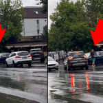 Șofer agresiv blochează traficul într-o intersecție din Sectorul 4 al Capitalei, pe carosabil umed