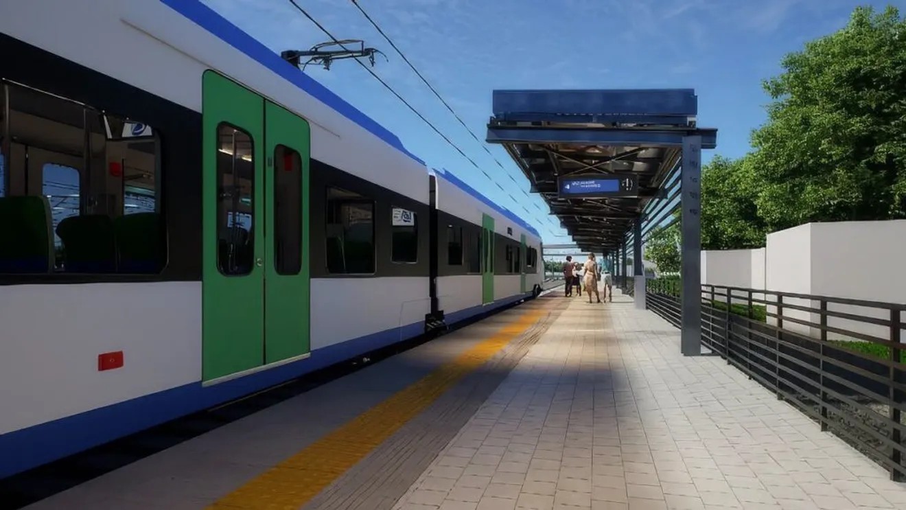 Tren metropolitan București-Ilfov oprit într-o stație modernă, cu peron acoperit și acces pentru călători.